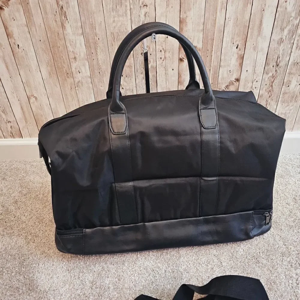 Kenneth Cole black duffel bag